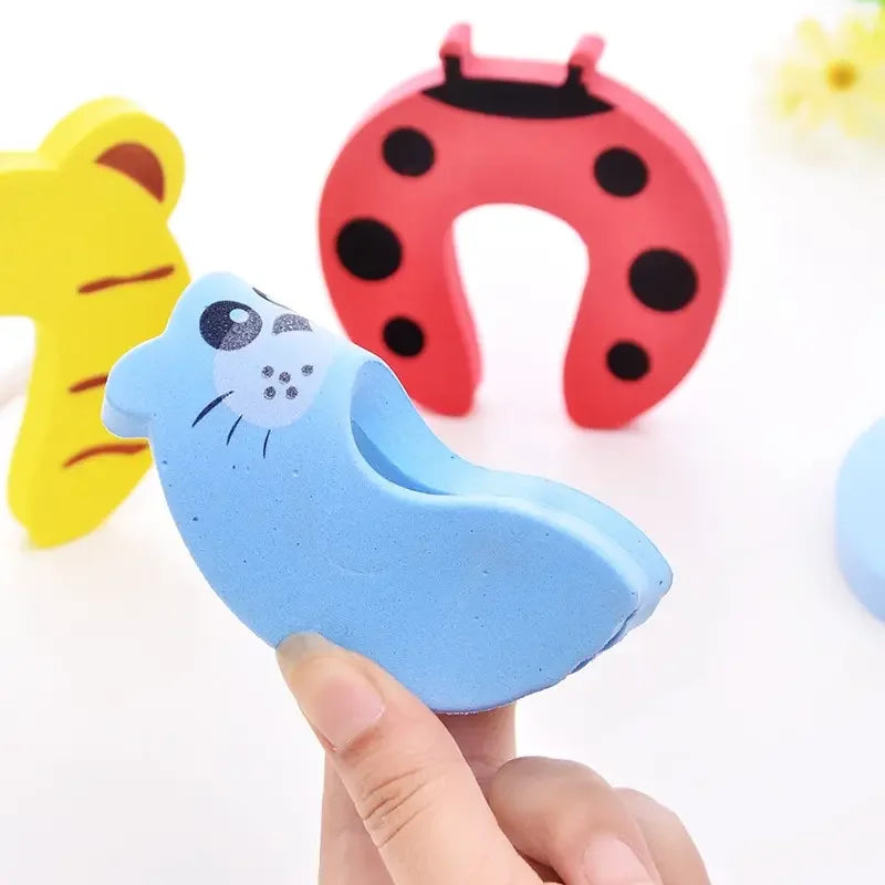 Baby sikkerhetsdørstopper - Anti-klem tegneserie fingerlås